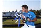 EASTBOURNE, ENGLAND - JUNE 21:  Feliciano Lopez of Spain poses with the trophy after beating Richard Gasquet of France during their Men's Singles Finals match on day eight of the Aegon International at Devonshire Park on June 21, 2014 in Eastbourne, England. (Photo by Jan Kruger/Getty Images)